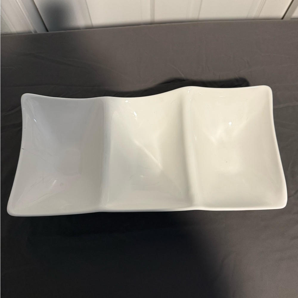 White porcelain or ceramic 3 compartment serving dish.